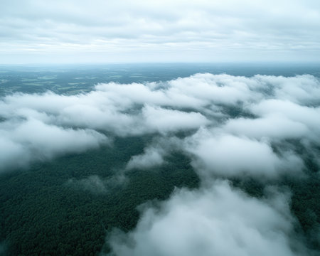 Soaring above a sea of clouds, majestic mountains pierce the mist, creating a breathtaking panorama Misty peaks and hidden valleys offer a tranquil escape This serene, powerful image, perfect for desktops or travel posters, captures the captivating allure of clouds enveloping remote mountain ranges AI Generativeの素材
