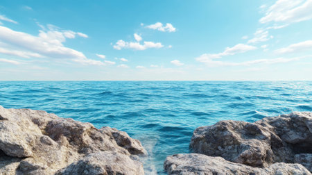 Escape to a tranquil scene where soft sunlight kisses an azure sky This captivating image offers limitless views of breathtaking coastlines, where clear blue waters meet the horizon Perfect for travel and landscape photography, it inspires relaxation and invites exploration of the vast seascape, illuminated by gentle light on rocky AI Generativeの素材
