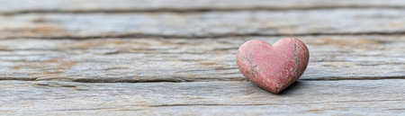 A pink heart, symbolizing love, floats above charity and connection icons on rustic wood This image blends altruism with affection, conveying a powerful message of love, kindness, unity, and care Its simple design makes it perfect for expressing sentiments with warmth and symbolism AI Generativeの素材