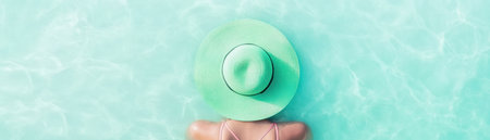 Escape to paradise with a vibrant tropical beach scene Turquoise water shimmers under bright light, while a green sunhat hints at relaxation Colorful swimwear adds to the allure of this tranquil escape Imagine diving into the cool, lapping waves A breathtaking view awaits AI Generativeの素材