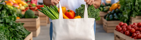 Immerse yourself in the vibrant atmosphere of a local farmers' market! A reusable bag overflows with fresh vegetables, embodying healthy living and community support Promote eco-consciousness, local farmers, and farm-to-table experiences with this image Encourage sustainable practices and a deeper connection to our food sources AI Generativeの素材