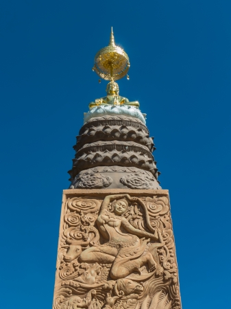Gold buddha on the poleの写真素材