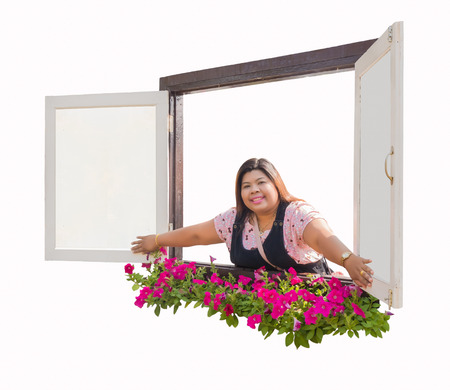 Woman open the window in the morning の写真素材