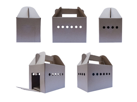 Cardboard box with door opened for carrying small pet such as hamster,bird の写真素材