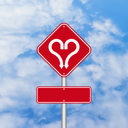 Heart shape with arrow road signの写真素材