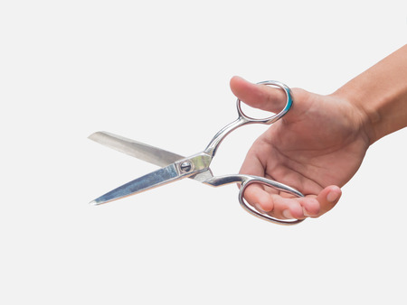Stainless steel Scissors in hand on white background