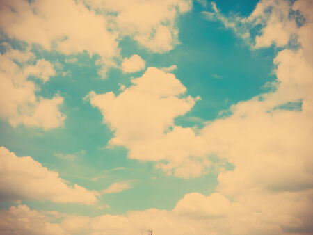 Blue sky and cloud with vintage filter effectの写真素材