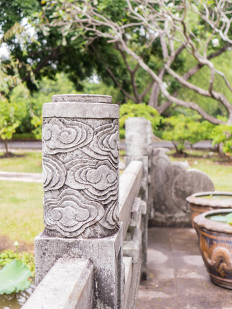 Close up cloud pattern on concrete pole, Chinese decoration styleの写真素材