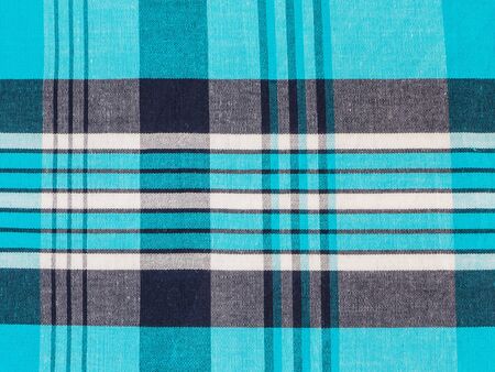 Tartan plaid cotton fabric.Tiles texture for the background