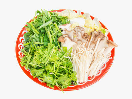 Chopped vegetables and mushroom on tray isolated on white with clipping pathの写真素材