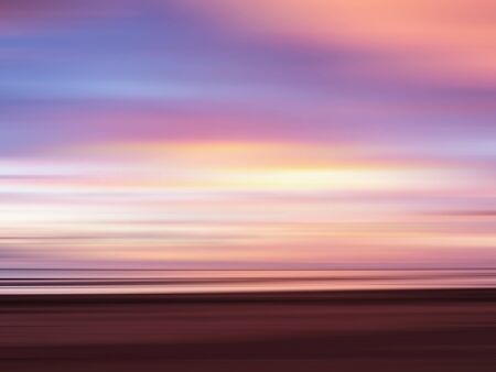 Abstract  colorful cloud and sky sunset seascape. Blurred panning motion.の写真素材