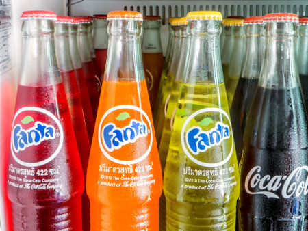 BANGKOK- JUNE 2015 :  Group of Coca-Cola and Fanta Bottles on shelf in refrigerator. The three drinks produced by the Coca-Cola Companyのeditorial素材