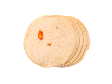 Spicy ham sausage or rolled bologna slices on white backgroundの写真素材