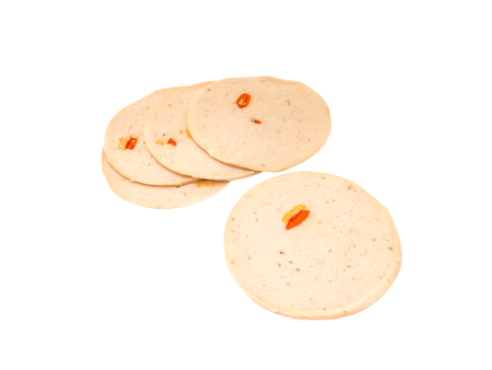 Spicy ham sausage or rolled bologna slices on white backgroundの写真素材