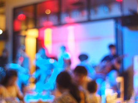 Abstract blurred background of music band in restaurant at nightの写真素材