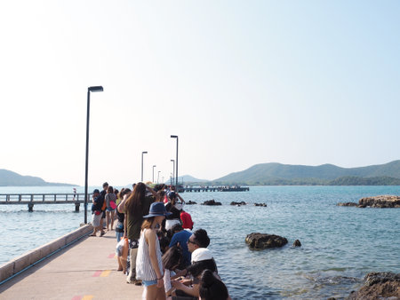 CHONBURI,THAILAND-MARCH 11,2017: Tourists at Mah Jor Port, Sattahip Naval Base in Chonburi province,Thailand waiting for a boat across to Koh Kham or Koh Samae San island.のeditorial素材