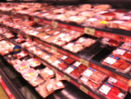 Abstract blur background of supermarket with meat product shelf for shopping conceptsの写真素材