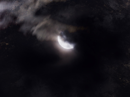 Abstract night sky with full moon for halloween background. Grunge and noise filter effect.の写真素材