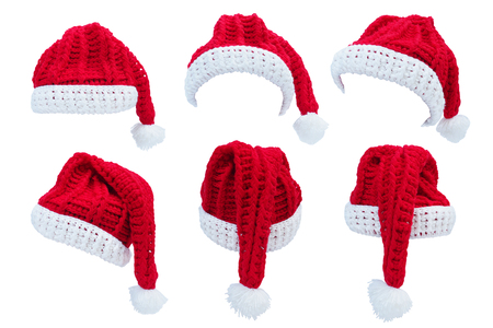 Set of red and white Santa claus hat isolated on white background. Christmas holiday concept.の写真素材