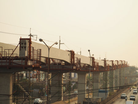 Bangkok, Thailand - January 19, 2020 : The construction area of ââthe Electric Train Project at Ramintra Road and air pollution PM 2.5 dust in the morning.のeditorial素材