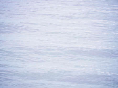 Wave ripples on water sea surface. Abstract ocean pattern background.の写真素材