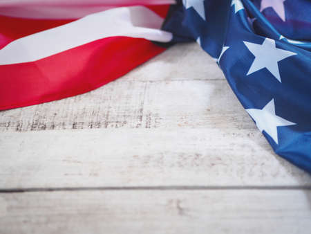 Close up of American flag on vintage wood for 4th of July holiday background.の写真素材