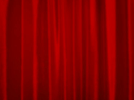 Abstract blurry red velvet curtain on stage. Christmas or Chinese new year background.の写真素材