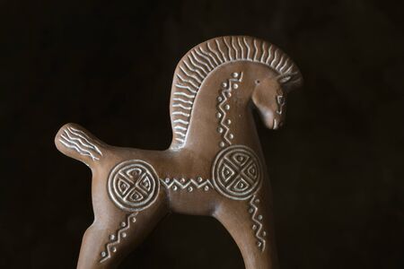 Decorative clay horse, broken and glued, purchased as a souvenir in Greece.の写真素材
