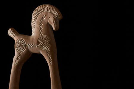 Decorative clay horse, broken and glued, purchased as a souvenir in Greece.の写真素材