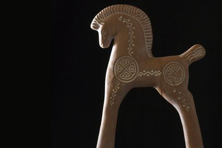 Decorative clay horse, broken and glued, purchased as a souvenir in Greece.の写真素材