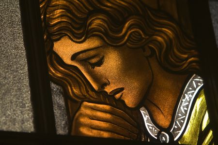 Stained-glass window in a Roman Catholic church.の写真素材