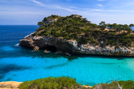 Beautiful beach bay azure sea water, Cala des Moro, Majorca island, Spainの写真素材