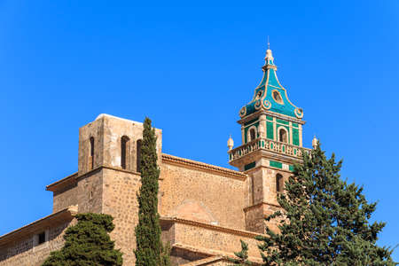 Church tower in Valdemossa village, Majorca island, Spainの写真素材