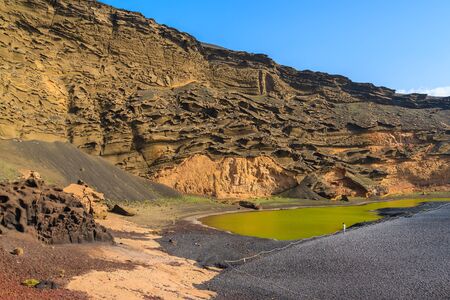 View of famous green water Lago Verde lake, El Golfo, Lanzarote, Canary Islands, Spainの写真素材