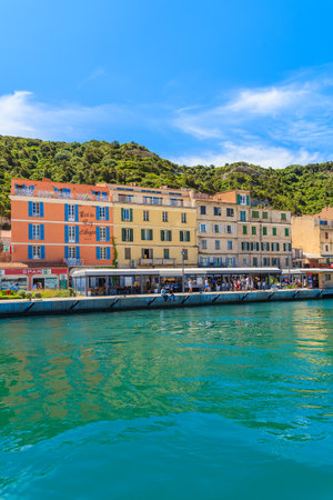 BONIFACIO PORT, CORSICA ISLAND - JUN 25, 2015: colorful houses in Bonifacio port. This coastal town is famous tourist destinatioのeditorial素材
