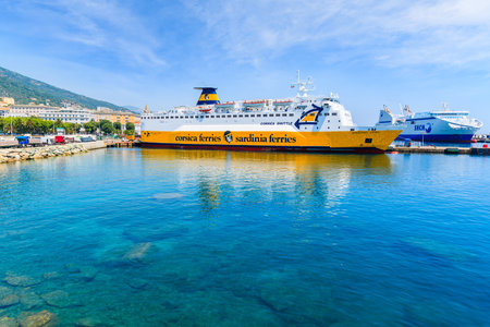 BASTIA PORT, CORSICA ISLAND - JUL 4, 2015: ferry in Bastia port preparing for sailing to Livorno, Italian port across Ligurian Sのeditorial素材