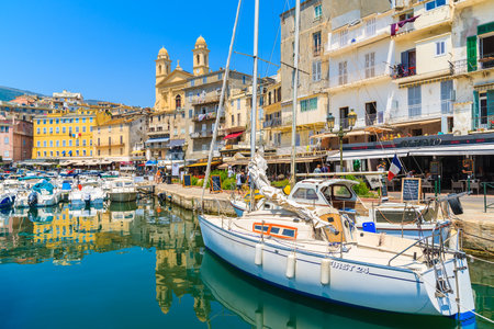 BASTIA PORT, CORSICA ISLAND - JUL 4, 2015: sailing boat in Bastia port on sunny summer day. Corsica is a French islandのeditorial素材