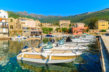 ERBALUNGA PORT, CORSICA ISLAND - JUL 4, 2015: Colorful boats mooring in Erbalunga port on Cap Corse, Corsica island, France.のeditorial素材