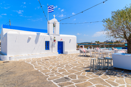 Square with typical white Greek church in Naoussa port, Paros island, Cyclades, Greeceの写真素材