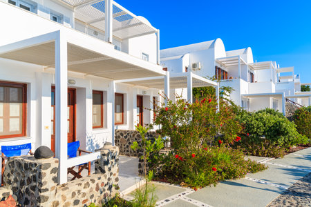 SANTORINI ISLAND, GREECE - MAY 23, 2016: Traditional style Greek holiday apartments in Imerovigli village, Santorini island, Greece.のeditorial素材