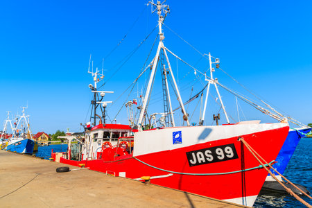 JASTARNIA PORT, POLAND - JUN 21, 2016: traditional fishing boats anchoring in Jastarnia port on sunny summer day, Hel peninsula, Baltic Sea, Poland.のeditorial素材