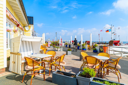 SYLT ISLAND, GERMANY - SEP 6, 2016: restaurant tables in List port on northern coast of Sylt island, Germany.のeditorial素材