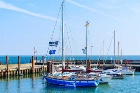 LIST PORT, SYLT ISLAND - SEP 6, 2016: sailing boats anchoring in small port of List village on sunny summer day, Germany.のeditorial素材