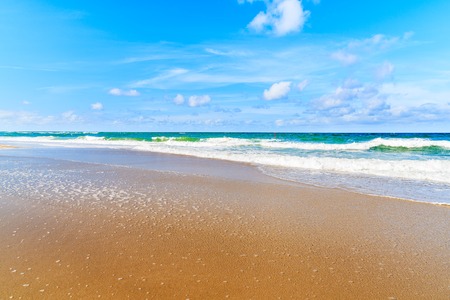 Beautiful sea waves on Kampen beach on sunny summer day, Sylt island, North Sea, Germanyの写真素材