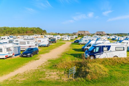 SYLT ISLAND, GERMANY - SEP 11, 2016: campers on green area of camping site on beautiful island of Sylt, Germany.のeditorial素材
