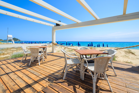 Beach restaurant in Cala Sinzias on sunny summer day, Sardinia island, Italyの写真素材