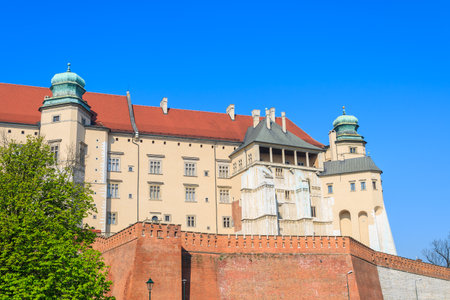 Royal Wawel castle building against blue sky on sunny spring day, Krakow, Polandのeditorial素材