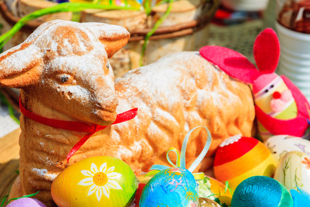 Dough sheepskin and colourful Easter Eggs on food stall, Krakow, Poland