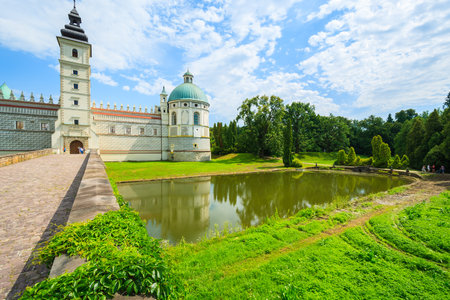 Beautiful Krasiczyn castle and lake on a sunny summer day, Polandのeditorial素材