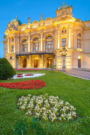 Illuminated front facade of Slowackiego Theatre in Krakow, Polandのeditorial素材